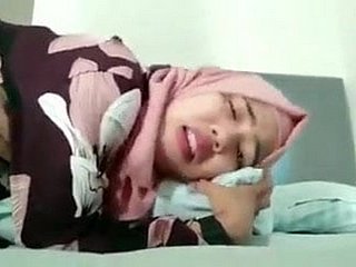 التودونغ أو الحجاب قنا الكلب kesakitan