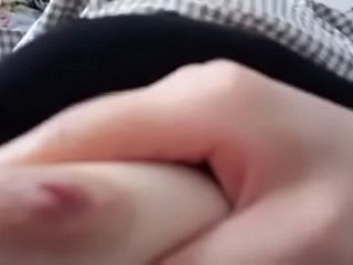 Chinesisches Mädchen mit Selbstauslöser